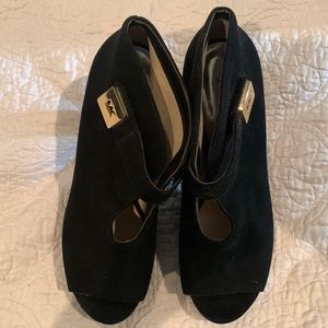 Michael Kors black suede bootie with peekaboo toe.